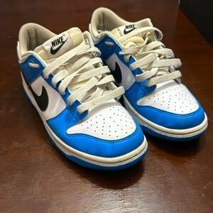 Electric blue and black dunks.